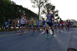 Mulberry Island Half Marathon participants take off from the race starting line at Fort Eustis, Va., Sept. 19, 2015. This is the race’s, which also includes a 5K, 34th year in action. While on a military installation, the race was open to civilian runners as well to strengthen bonds with the community. (U.S. Air Force photo by Staff Sgt. Natasha Stannard/Released)