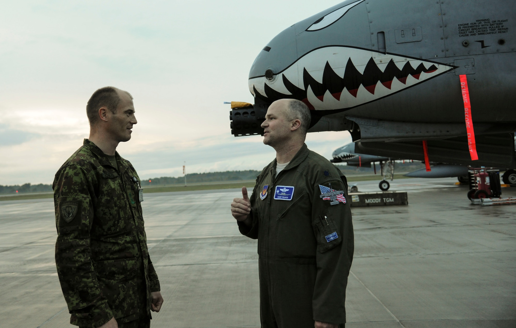 Estonian Air Force Lt. Col. Uhal Lohmas, Amari Air Base commander (left), welcomes U.S. Air Force Lt. Col. Bryan France, 74th Expeditionary Fighter Squadron commander, to Estonia at Amari Air Base, Estonia, Sept 21, 2015. Estonia is the first stop for the 74th EFS who are deployed as part of a Theater Security Package. (U.S. Air Force photo by Andrea Jenkins/Released)