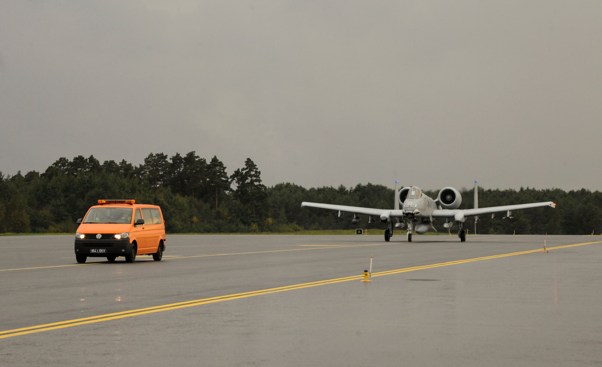 The first of 12 U.S. Air Force A-10C Thunderbolt IIs assigned to the 74th Expeditionary Fighter Squadron lands at Amari Air Base, Estonia Sept 21, 2015. Approximately 350 Airmen and support equipment from the 23d Wing at Moody Air Force Base, Ga., will conduct routine flying training and participate in several exercises and training events with NATO allies to strengthen interoperability and demonstrate U.S. commitment to the security and stability of Europe. (U.S. Air Force photo by Andrea Jenkins/Released)