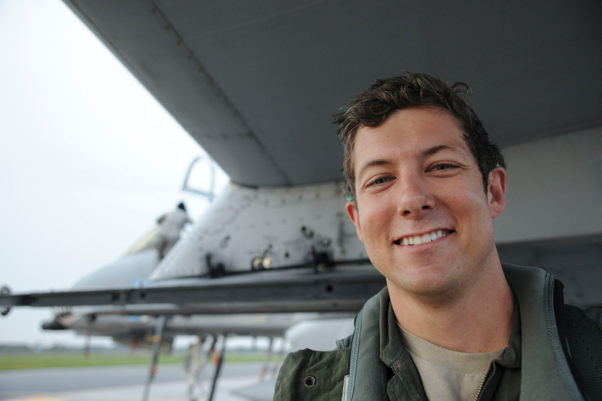 U.S. Air Force Capt. William Pipenbring, 74th Expeditionary Fighter Squadron A-10C Thunderbolt II pilot, poses for a photo after landing at Amari Air Base, Estonia Sept 21, 2015. Pipenbring is deployed from the 23d Wing at Moody Air Force Base, Ga. as part of a six month Theater Security Package in support of Operation Atlantic Resolve. (U.S. Air Force photo by Andrea Jenkins/Released)