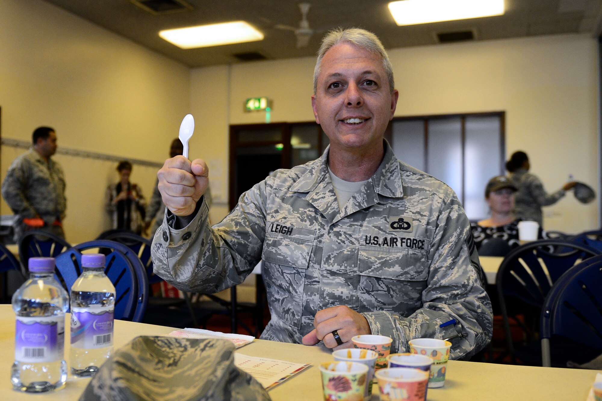 Chief Master Sgt. Stanley Leigh, Combined Federal Campaign Chili Cook-off judge from the 48th Operations Support Squadron, prepares to taste every batch of chili at the kick-off event at Royal Air Force Lakenheath, England, Sept. 21, 2015. The purpose of the campaign is to raise funds for charitable organizations. (U.S. Air Force photo by Airman 1st Class Erin R. Babis/Released) 