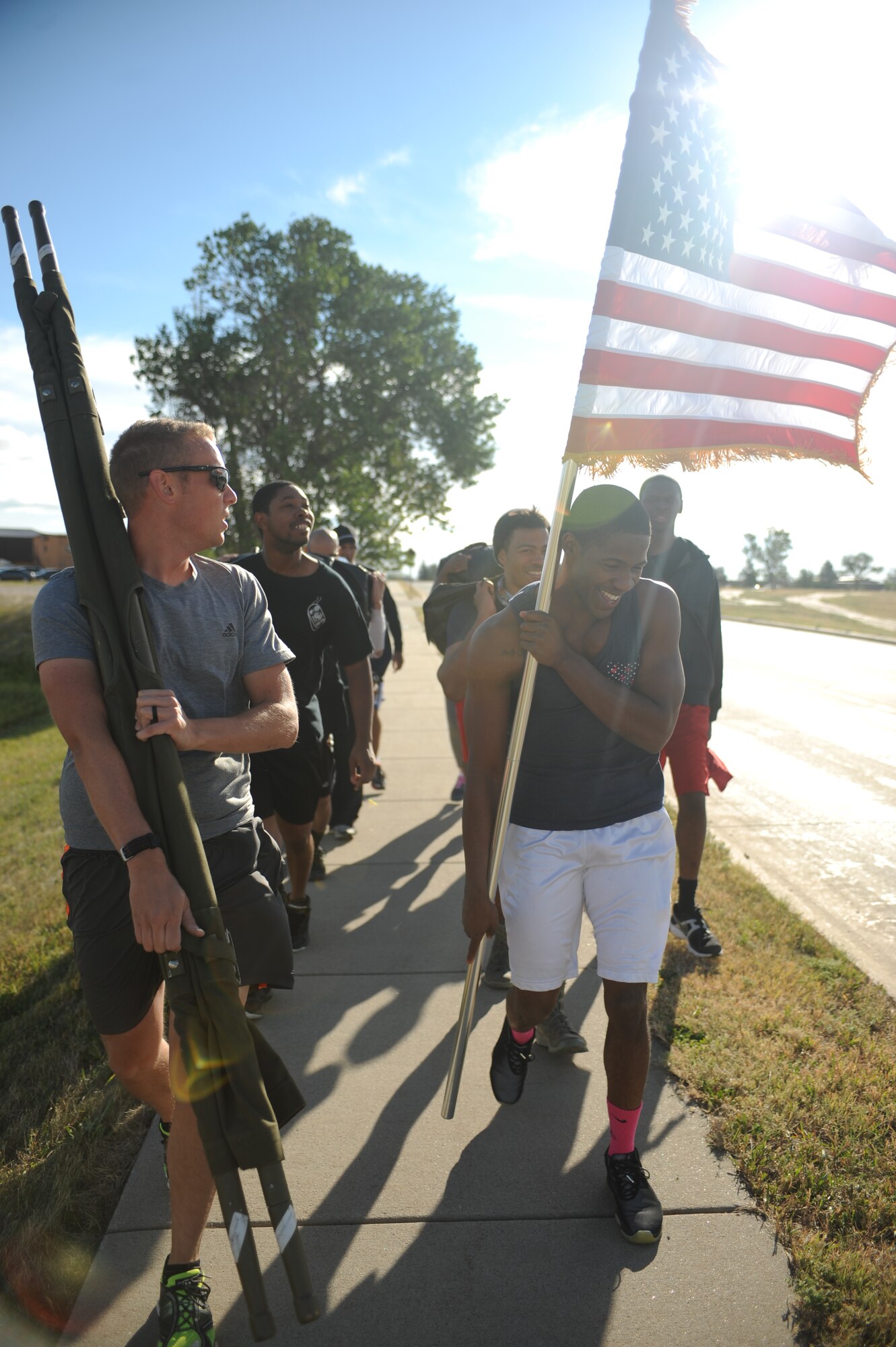 Airmen participate in a team cohesion challenge ruck march at Ellsworth Air Force Base, S.D., Sept. 18, 2015. Approximately 10 Airmen participated in the march and a similar event is being scheduled for next year. (U.S. Air Force photo by Airman Sadie Colbert/Released)