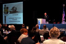 Col. Christopher Larson, 69th Reconnaissance Group commander, informs attendees at the Ninth Annual UAS Summit and Expo Grand Sky Congressional Breakfast of the affordability and long-term sustainment of the RQ-4 Global Hawk in Grand Forks, North Dakota, Sept. 21, 2015. The Congressional Breakfast drew in an audience of more than 200 people including representatives from the governor’s office and North Dakota senators. (U.S. Air Force photo by Airman 1st Class Bonnie Grantham/released)