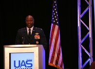 Col. Rodney Lewis, 319th Air Base Wing commander, speaks at the Ninth Annual UAS Summit and Expo Grand Sky Congressional Breakfast in Grand Forks, North Dakota, Sept. 21, 2015. The event consisted of more than 200 attendees including representatives from the governor’s office and the North Dakota senators. (U.S. Air Force photo by Airman 1st Class Bonnie Grantham/released)