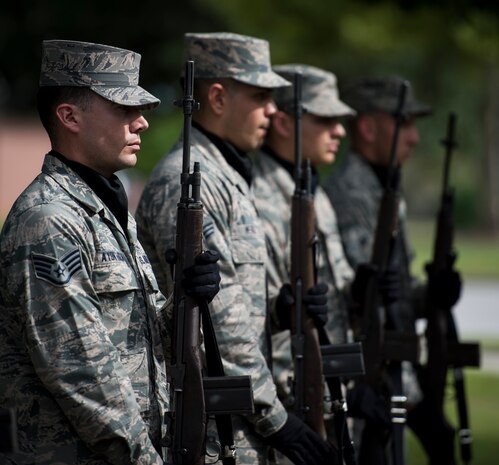 A Joint Base Charleston Honor Guard firing party detail performs a 21-gun salute during the POW/MIA retreat ceremony Sept. 18, 2015, at the base flag pole on JB Charleston – Air Base, S.C. The ceremony included a 21-gun salute by the Honor Guard, a wreath-laying and a live bugle performance in recognition of captured and missing U.S. servicemembers. (U.S. Air Force photo/Airman 1st Class Clayton Cupit)