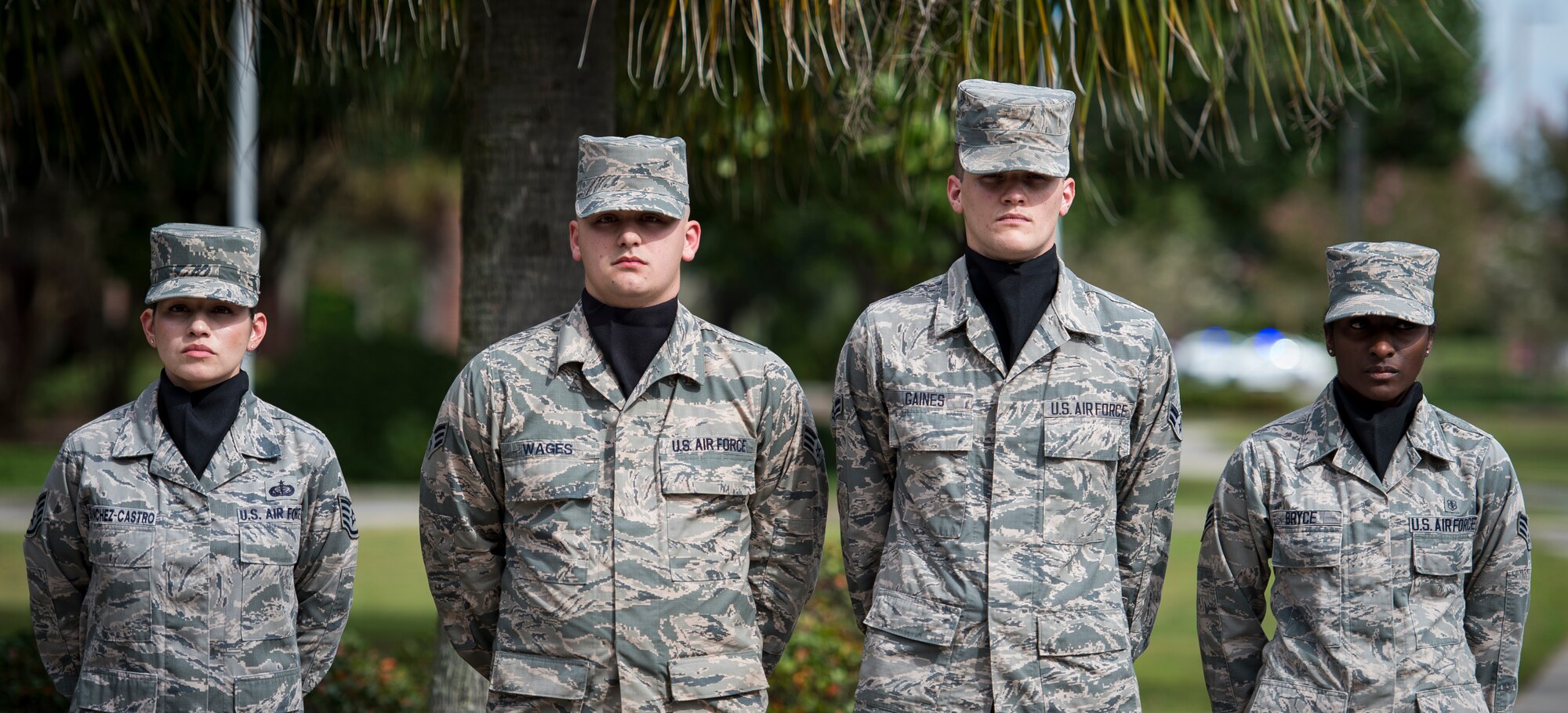 A Joint Base Charleston Honor Guard detail stands at parade rest while waiting for reveille to sound during the POW/MIA retreat ceremony Sept. 18, 2015, at the base flag pole on JB Charleston – Air Base, S.C. The ceremony included a 21-gun salute by the Honor Guard, a wreath-laying and a live bugle performance in recognition of captured and missing U.S. servicemembers. (U.S. Air Force photo/Airman 1st Class Clayton Cupit)
