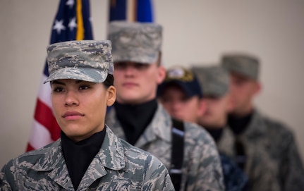 A Joint Base Charleston Honor Guard colors detail waits to start the ceremony beginning the POW/MIA luncheon Sept. 18, 2015, at the Charleston Club on JB Charleston – Air Base, S.C. National POW/MIA Recognition Day is an annual event that honors servicemembers who were prisoners of war or missing in action. (U.S. Air Force photo/Airman 1st Class Clayton Cupit)