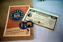 A 2015 U.S. Air Force ball ticket, program and coin at the Air Force ball at Minot AFB, N.D., Sept. 19, 2015. The Air Force ball celebrates the birth of the U.S. Air Force which was created on Sept. 18, 1947. (U.S. Air Force photo by 2d Lt. Kylee Ashton)