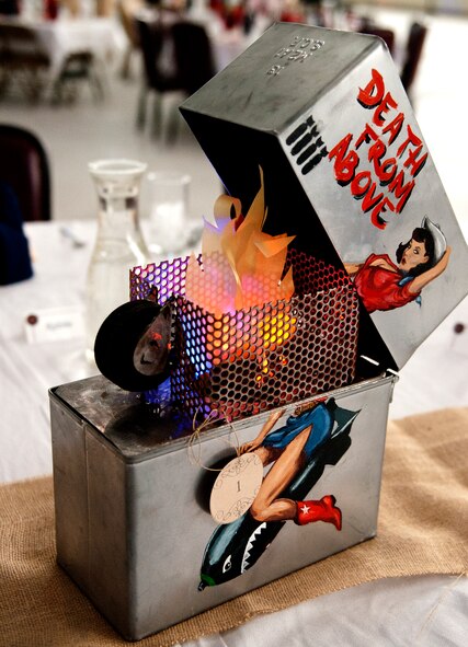 An ammo can center piece at the Air Force ball at Minot AFB, N.D., Sept. 19, 2015. The Air Force ball celebrates the birth of the U.S. Air Force which was created on Sept. 18, 1947. (U.S. Air Force photo by 2d Lt. Kylee Ashton)