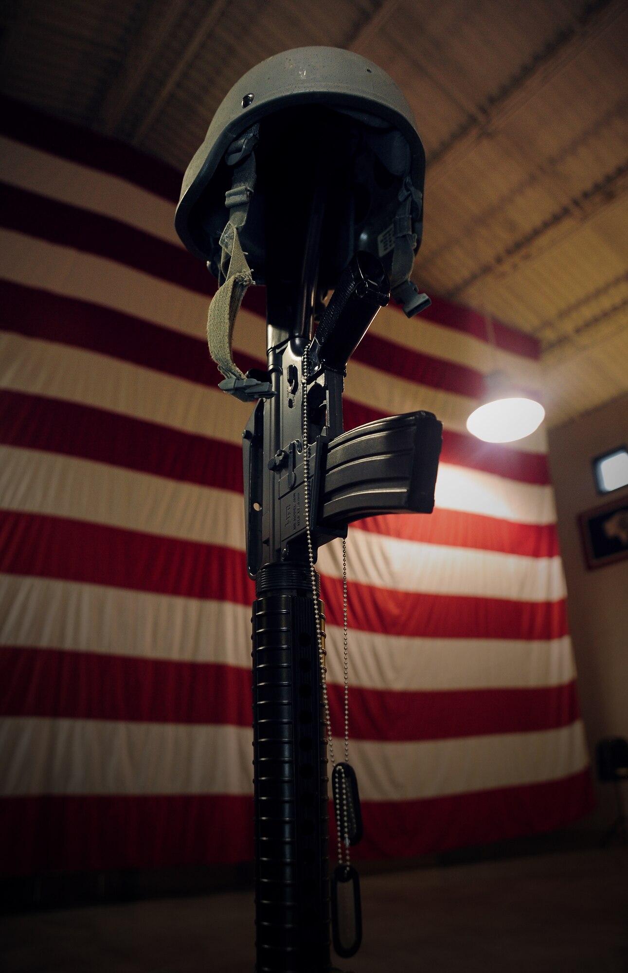 A Fallen Warrior Memorial stands as the closing ceremony commences for the annual Prisoners of War/Missing in Action run at Whiteman Air Force Base, Mo., Sept.18, 2015. Congress has designated the third Friday of September as a day to commemorate the POWs and Service members missing in action. (U.S. Air Force photo by Airman 1st Class Jovan Banks/Released)