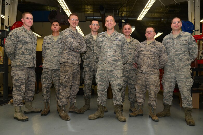 The 341st Civil Engineer Squadron power production shop poses for a group photo Sept. 17, 2015, at Malmstrom Air Force Base, Mont. Power production is responsible for providing back-up power to critical facilities on base to keep the mission from halting. (U.S. Air Force photo/Airman Daniel Brosam)