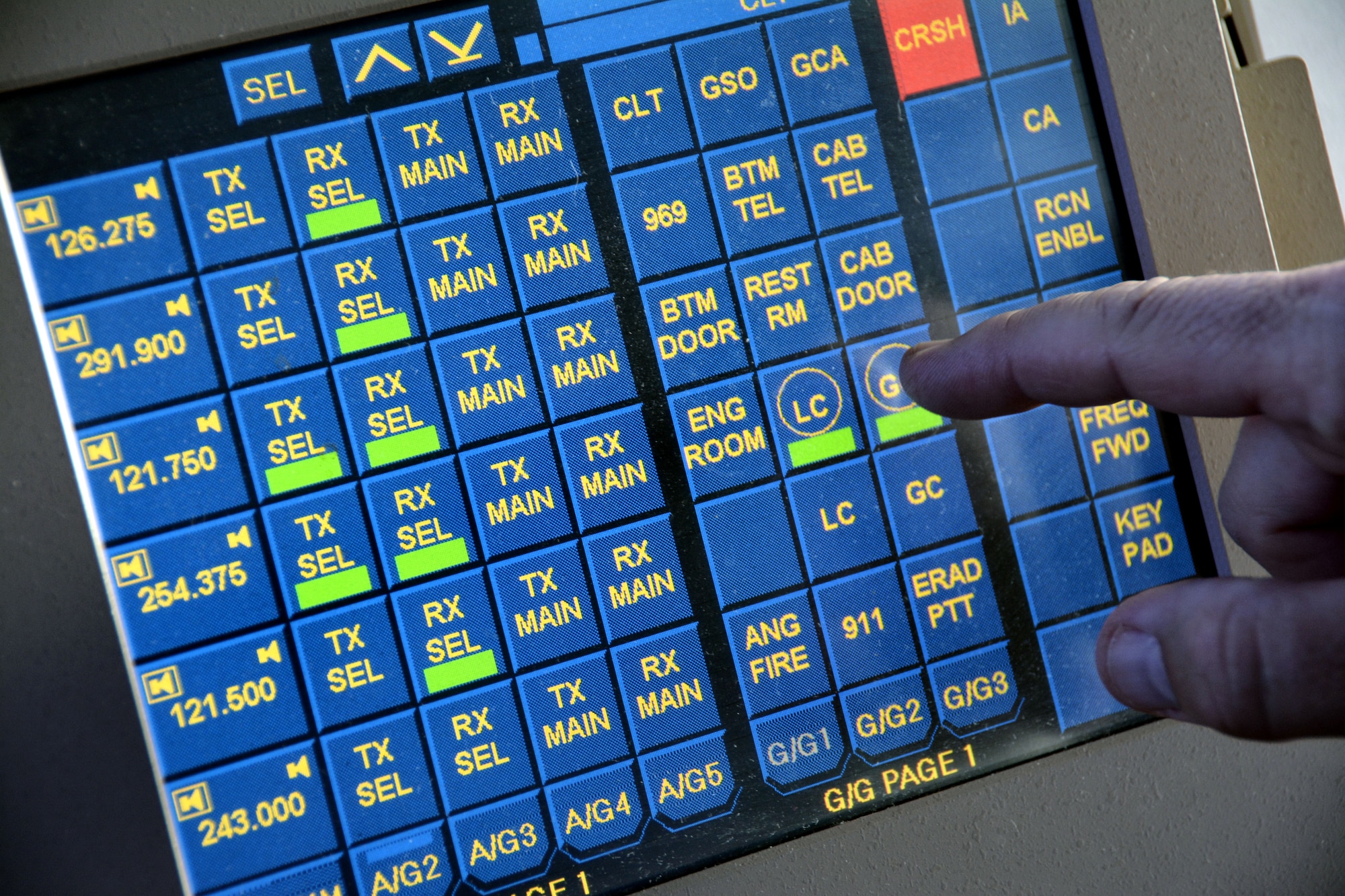 U.S. Air Force Master Sgt. Tony L. Parker, 235th Air Traffic Control Squadron, Tower Watch Supervisor, operates an Enhanced Terminal Voice Switch (ETVS) allowing quick access to pre-programed radio frequencies and telephone lines during daily operations, July 8, 2015. Parker is able to monitor all frequencies and positions at the same time making his response quicker and more efficient in case of a miscommunication. The 235th ATCS provides air traffic control services for all civilian and military aircraft at the Stanly County Airport, New London, N.C. (U.S. Air National Guard photo by Master Sgt. Patricia F. Moran, 145th Public Affairs/Released)