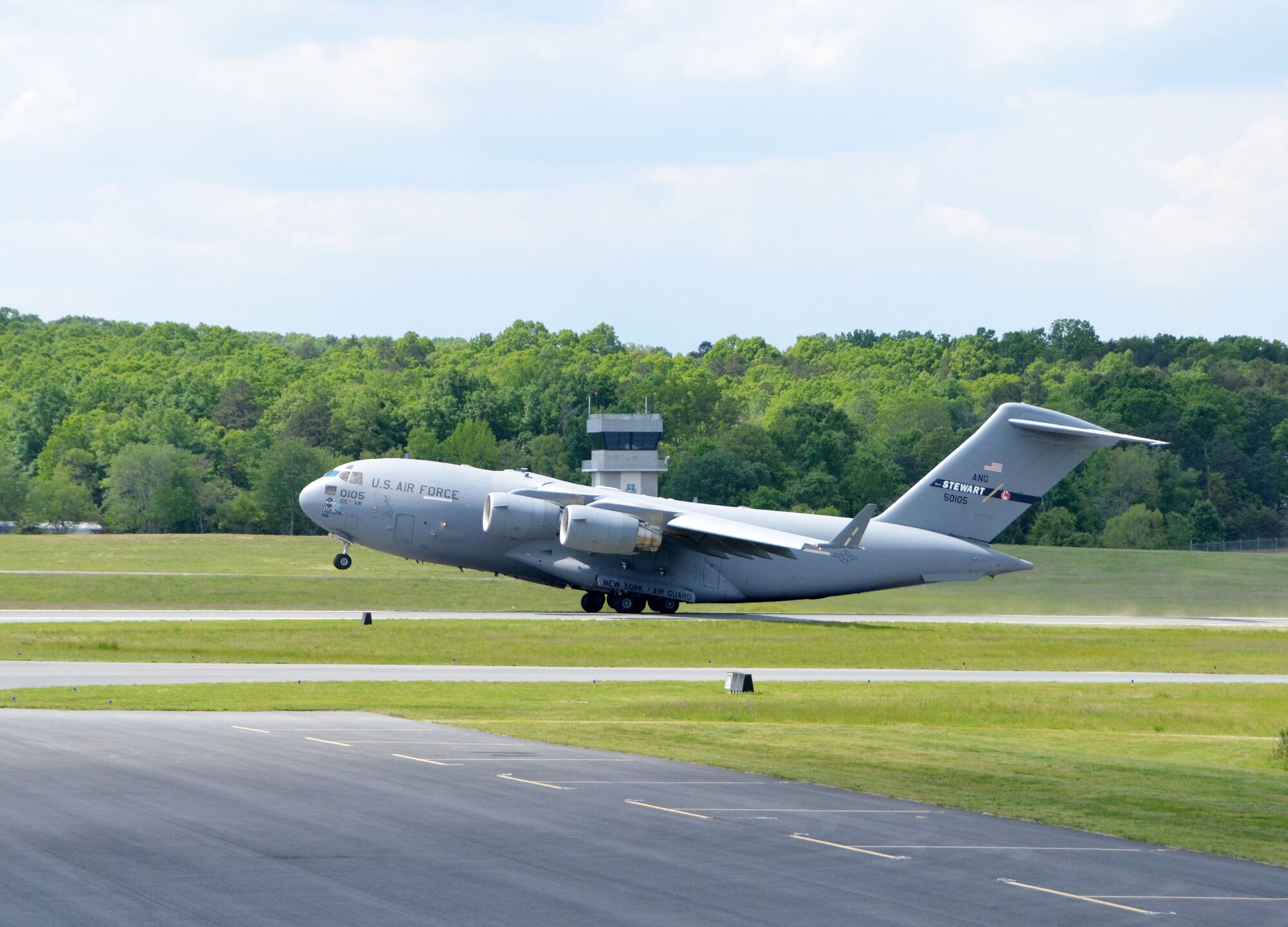 Aircrew onboard a C-17A Globemaster III, assigned to New York Air National Guard’s, 105th Airlift Wing, communicate with 235th Air Traffic Controllers in control tower, during take-off from Stanly County Airport in New London, N.C., April 30, 2015. The 235th ATC has provided air traffic control services for all civilian and military aircraft since their infrastructure started in 1988 when they formed a partnership with Stanly County Airport. (U.S. Air National Guard photo by Master Sgt. Patricia F. Moran, 145th Public Affairs/Released)