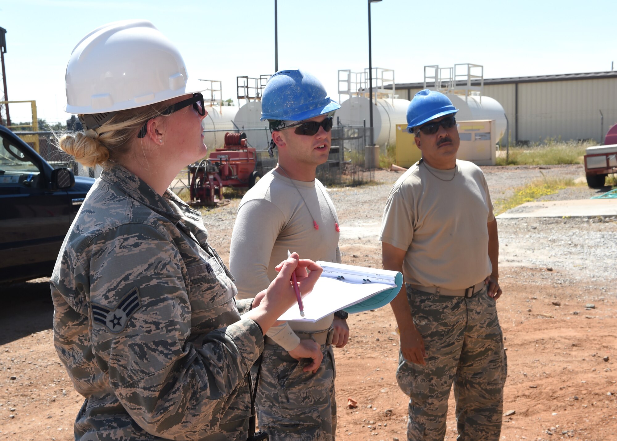 ALTUS AIR FORCE BASE, Okla. – U.S. Air Force Senior Airman Brooke Byerley, the lead draftsman for the project, fills out the daily inspection record during construction of a new entomology facility, Sept. 21, 2015. The daily inspection record includes information such as the date, weather conditions, daily manpower and supplies. (U.S. Air Force photo by Airman 1st Class Megan E. Acs/Released)