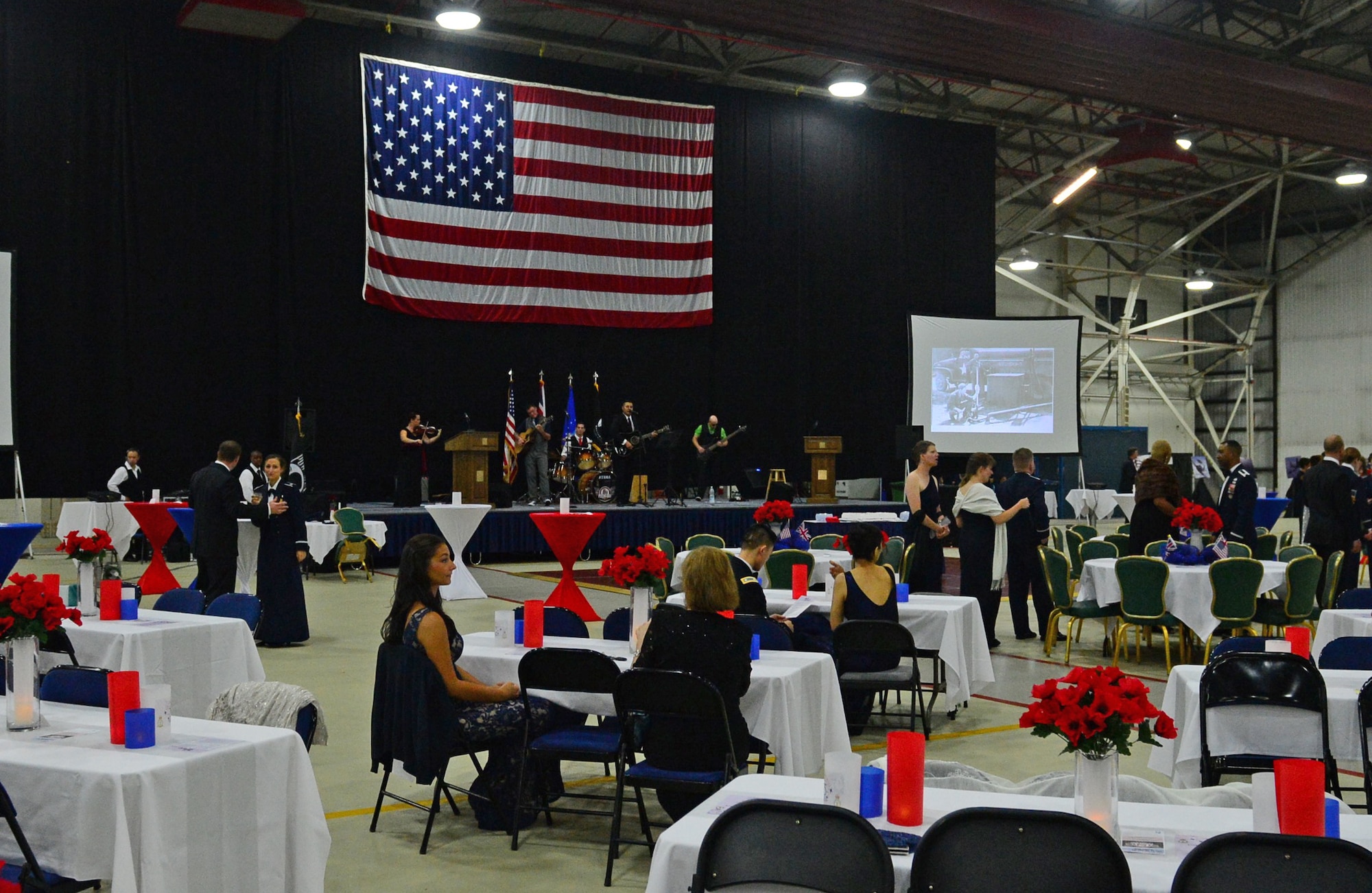 Airmen from Royal Air Forces Lakenheath and Mildenhall, RAF members and spouses attended the Air Force’s 68th birthday in conjunction with the 75th anniversary of the Battle of Britain at RAF Lakenheath, England, Sept. 18, 2015. The celebration consisted of a presentation of the colors, the playing and singing of the U.K. and U.S. national anthems, social hour, a cake-cutting ceremony and dancing. (U.S. Air Force photo by Senior Airman Erin O’Shea/Released) 