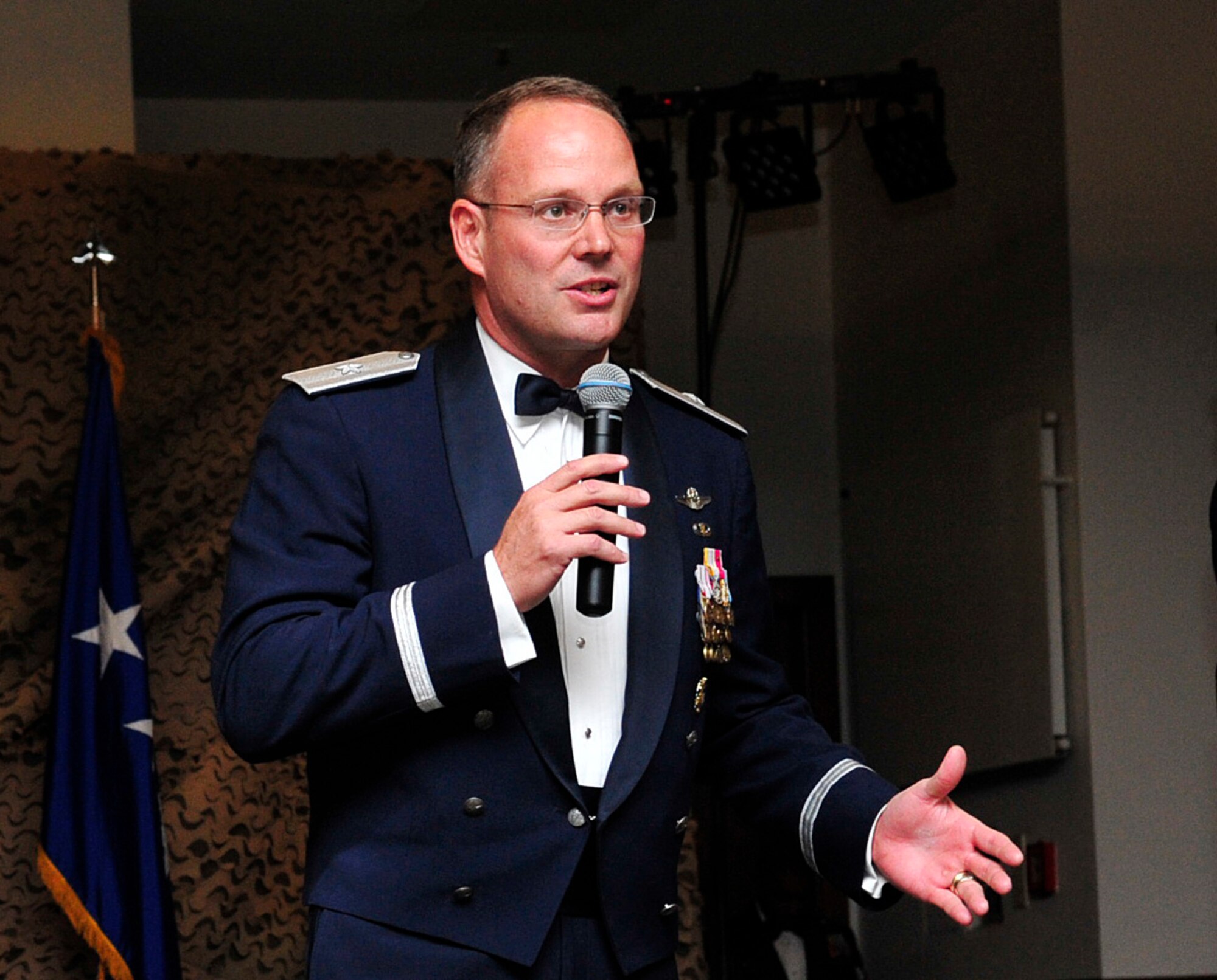 Brig. Gen. Jon T. Thomas, 86th Airlift Wing commander, speaks during the Air Force Ball Sept. 12, 2015, at Ramstein Air Base, Germany. The ball is an annual Air Force event, which celebrates the Air Force’s birthday and accomplishments. (U.S. Air Force photo/Airman 1st Class Larissa Greatwood)