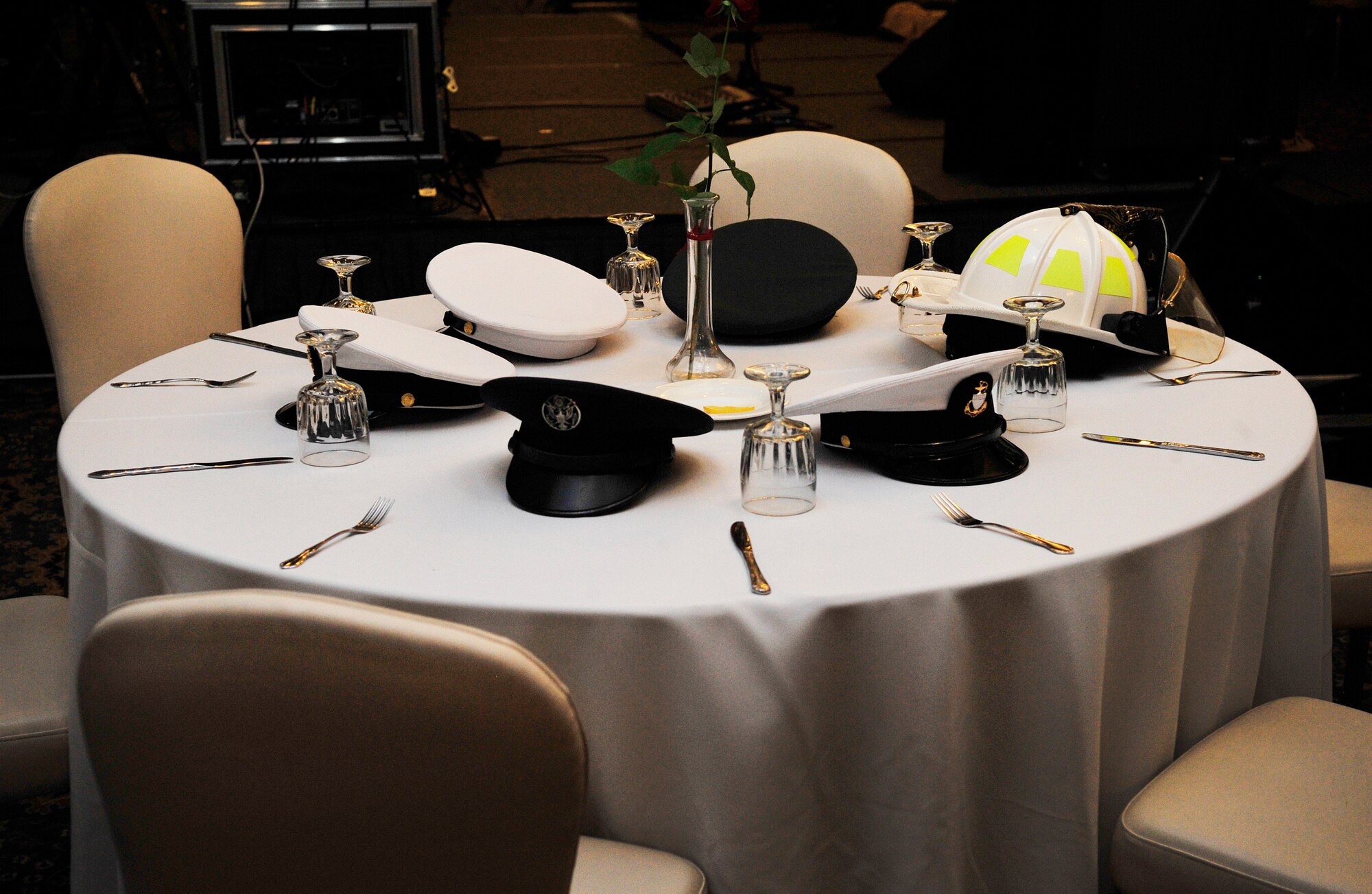 A lone table sits on the sidelines during the Air Force Ball in remembrance of the military members and civilians who are missing in action, prisoners of war and were killed in combat Sept. 12, 2015, at Ramstein Air Base, Germany. Along with the table, the Air Force Ball consisted of guest speakers commemorating the 25th anniversary of Operation Desert Storm and the traditional Air Force birthday cake-cutting ceremony. (U.S. Air Force photo/Airman 1st Class Larissa Greatwood)