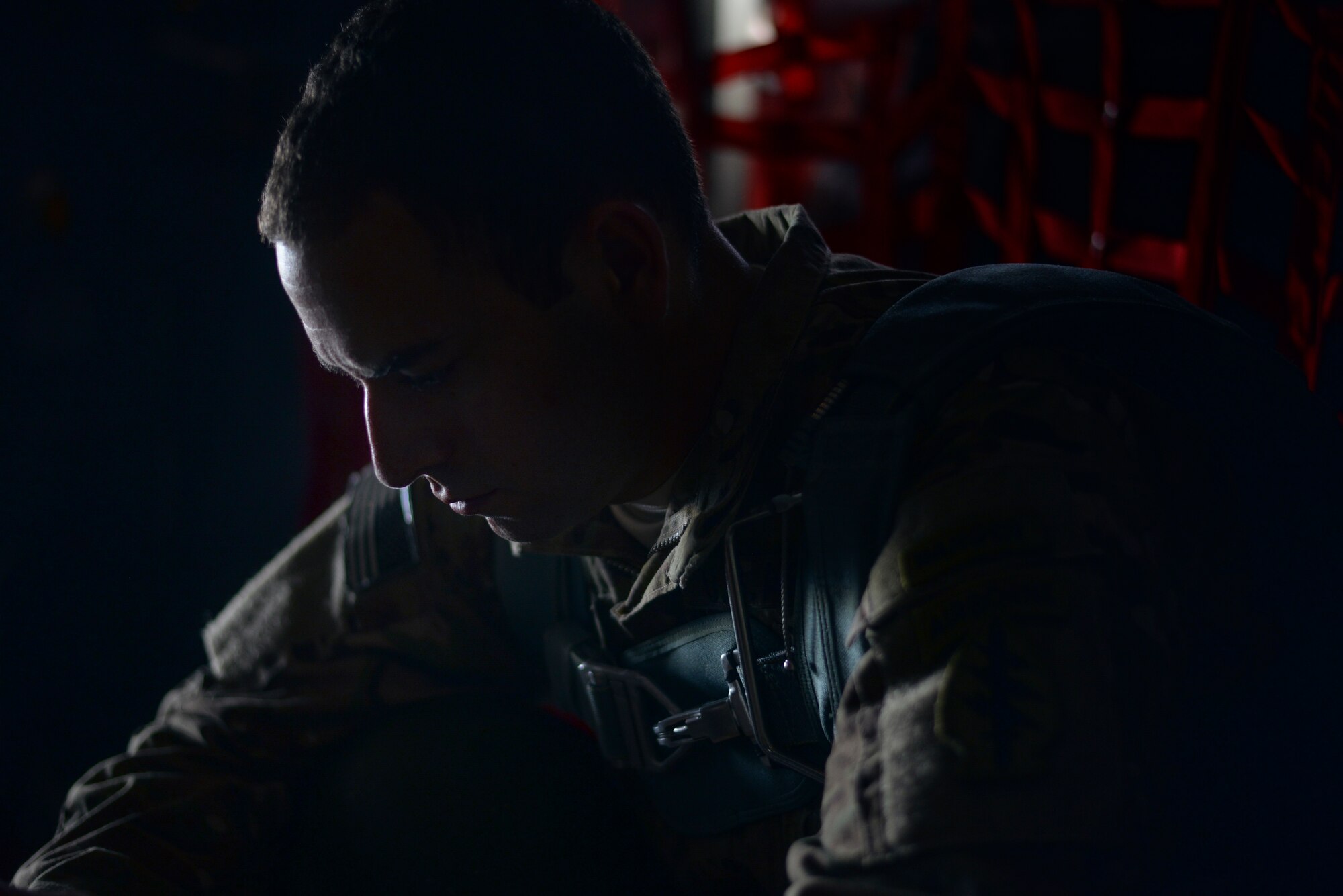 U.S. Army Staff Sgt. Jason Mullaney, 1st Battalion, 1st Special Forces Group (Airborne), prepares to conduct an airdrop jump demonstration from a C-130 Hercules over Yokota Air Base, Japan, during the Japanese-American Friendship Festival, Sept. 19, 2015. The demonstration was one of many events during the weekend that showcased U.S. military capabilities. (U.S. Air Force photo by Airman 1st Class Delano Scott/Released)