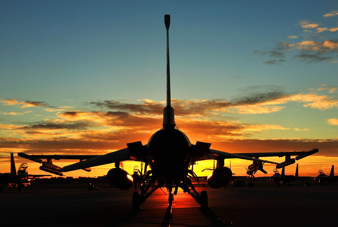 An F-16 Fighting Falcon aircraft sits on the flightline before morning sorties on Tyndall Air Force Base, Fla., Sept. 18, 2015. The aircraft is assigned to the Ohio Air National Guard's 180th Fighter Wing. Ohio National Guard photo by Air Force Senior Master Sgt. Beth Holliker