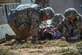 Medics from Joint Base Langley-Eustis, Va., pull a simulated patient to safety Sept. 17, 2015, at Melrose Air Force Range, N.M. Twenty-one teams of EMTs from 22 installations across the Air Force convened at Cannon Air Force Base, N.M., for two days of competition. Throughout the rodeo, teams were required to execute lifesaving missions under the critical eye of evaluators, demonstrating accurate techniques and effective implementation. (U.S. Air Force photo/Airman 1st Class Shelby Kay-Fantozzi)  
