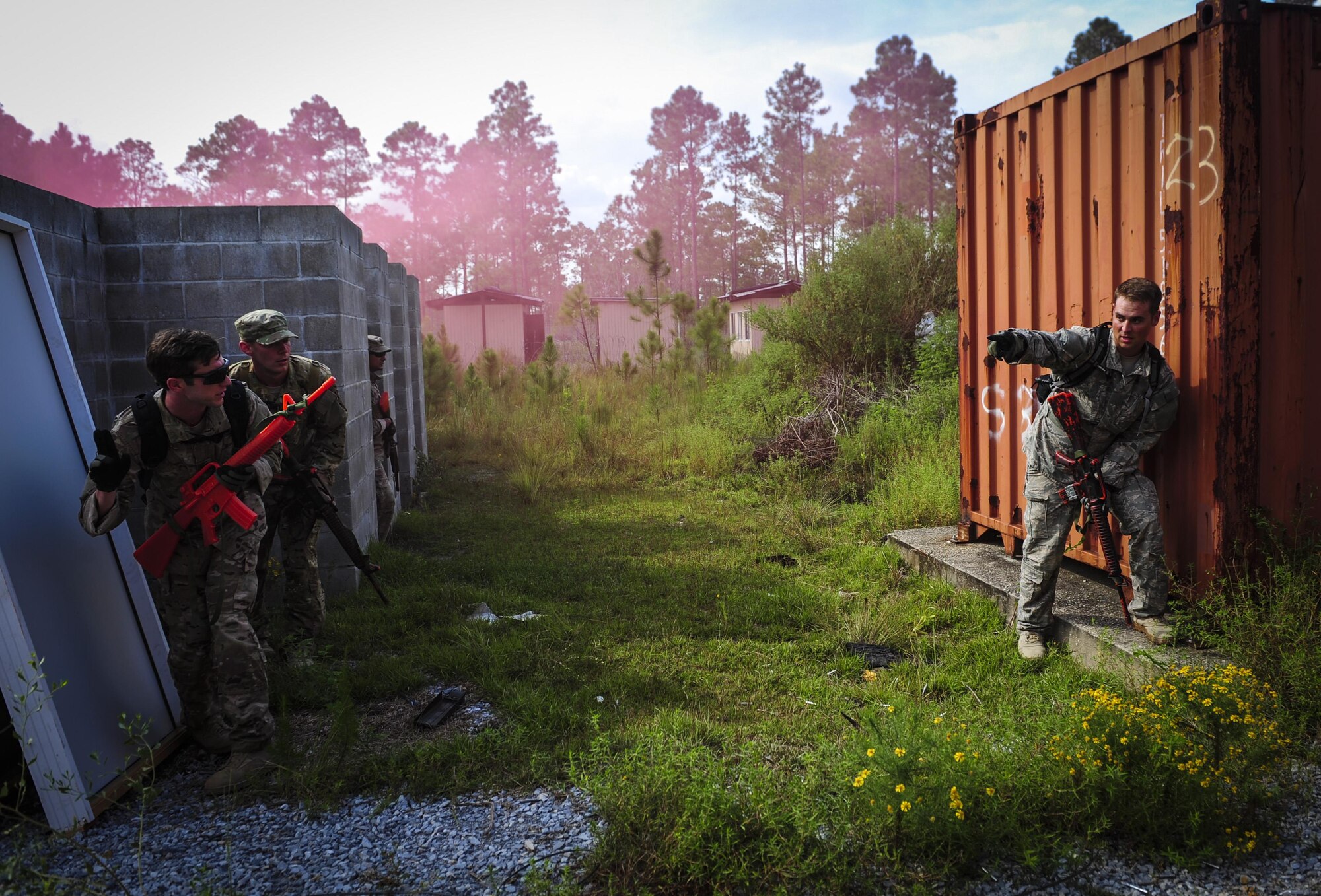 Aircrew members participate in urban clearing training at Eglin Field Complex, Fla., Sept. 2, 2015. Aircrew members participate in combat survival training tri-annually to maintain proficiency on skill sets such as combative, evasion, navigation, signaling, radio use and discipline and contact procedures. (U.S. Air Force photo by Senior Airman Meagan Schutter)