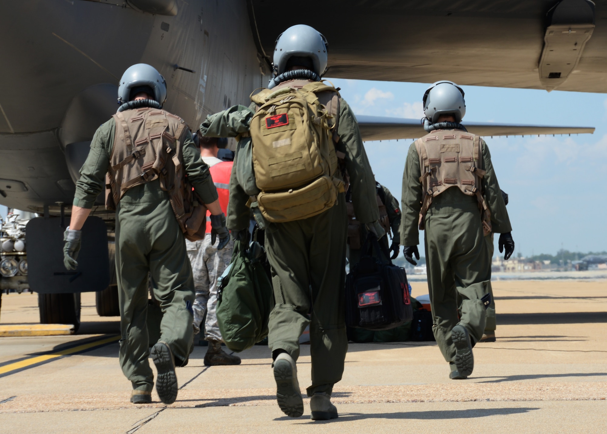 A B-52 Stratofortress aircrew assigned to Air Force Global Strike Command makes its way to the aircraft before participating in exercise Immediate Response 2015 at Barksdale Air Force Base, La., Sept. 17, 2015. The exercise supports the goal of a "strong Europe" by preparing partner nations to combine forces, ensuring unified security across allied nations. (U.S Air Force photo/Senior Airman Amanda Morris)