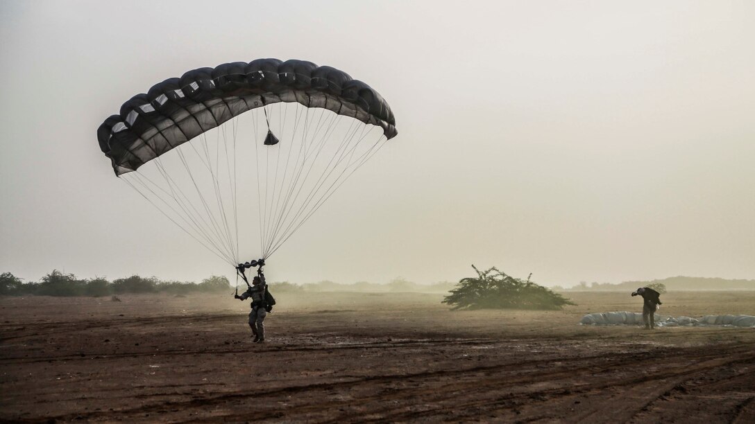 CAMP LEMONNIER, Djibouti (Sept. 14, 2015) U.S. Marines with the 15th Marine Expeditionary Unit’s Force Reconnaissance Detachment parachute out of a French C-160. Elements of the 15th MEU are conducting bilateral training with the 5th Overseas Combined Arms Regiment (RIAOM) and other French forces in Djibouti in order to improve interoperability between the MEU and the French military. (U.S. Marine Corps photo by Sgt. Steve H. Lopez/Released)