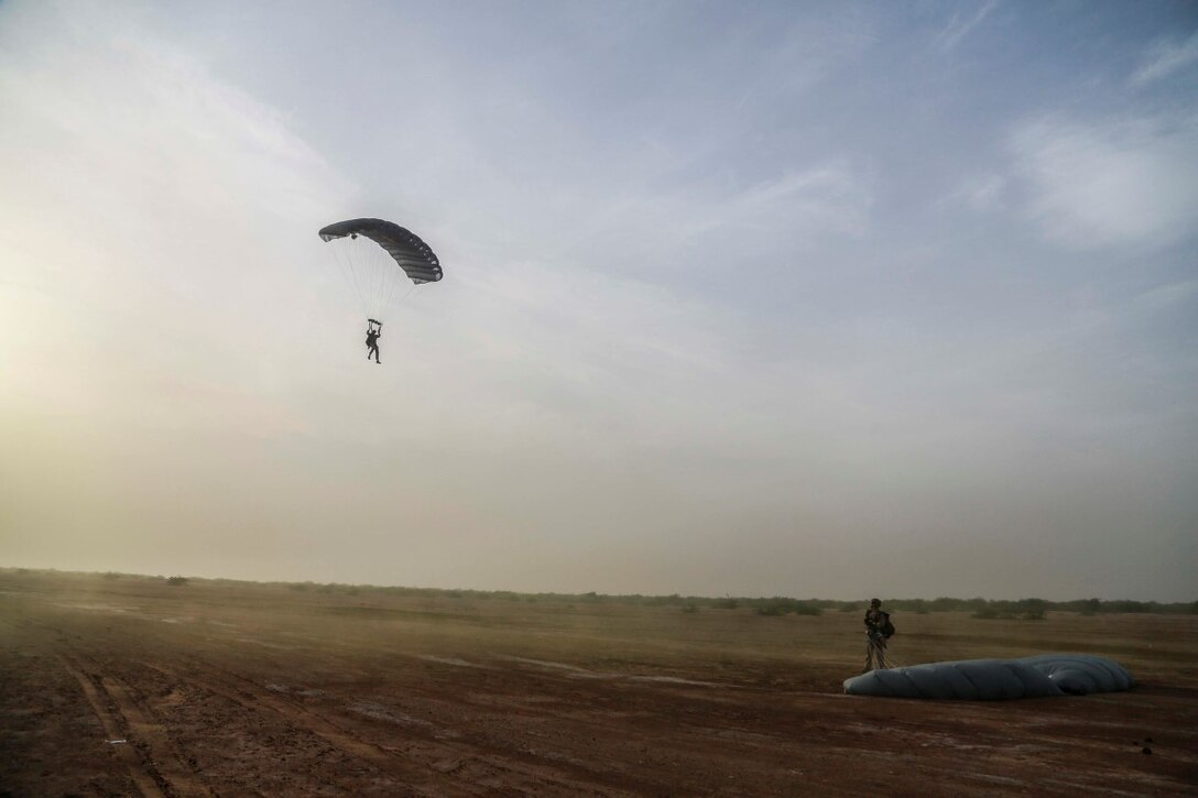 CAMP LEMONNIER, Djibouti (Sept. 14, 2015) U.S. Marines with the 15th Marine Expeditionary Unit’s Force Reconnaissance Detachment parachute out of a French C-160. Elements of the 15th MEU are conducting bilateral training with the 5th Overseas Combined Arms Regiment (RIAOM) and other French forces  in Djibouti in order to improve interoperability between the MEU and the French military. (U.S. Marine Corps photo by Sgt. Steve H. Lopez/Released)