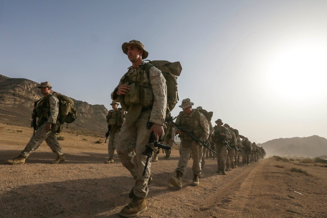 SOUTHWEST ASIA (Sept. 16, 2015) U.S. Marines with India Company, Battalion Landing Team 3rd Battalion, 1st Marine Regiment, 15th Marine Expeditionary Unit, hike to a range to conduct squad attacks during a bi-lateral training exercise. The 15th MEU, embarked aboard the ships of the Essex Amphibious Ready Group, is a forward-deployed, flexible sea-based Marine air-ground task force capable of engaging with regional partners and maintaining regional security. (U.S. Marine Corps photo by Sgt. Jamean Berry/Released)