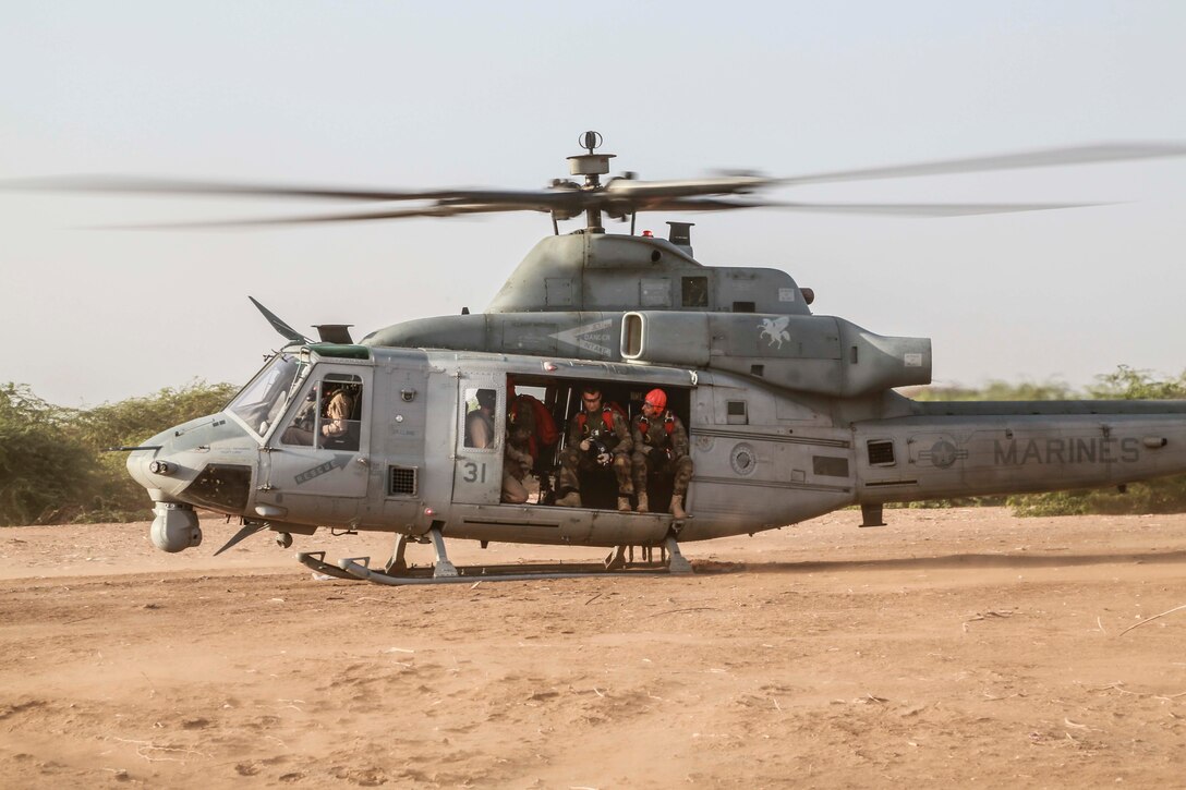 CAMP LEMONNIER, Djibouti (Sept. 16, 2015) U.S. Marines and French paratroopers prepare to take off in a UH-1Y Venom from Marine Medium Tiltrotor Squadron 161 (Reinforced). Elements of the 15th MEU are conducting bilateral training with the 5th Overseas Combined Arms Regiment (RIAOM) and French paratroopers in Djibouti in order to improve interoperability between the MEU and the French military. (U.S. Marine Corps photo by Sgt. Steve H. Lopez/Released)