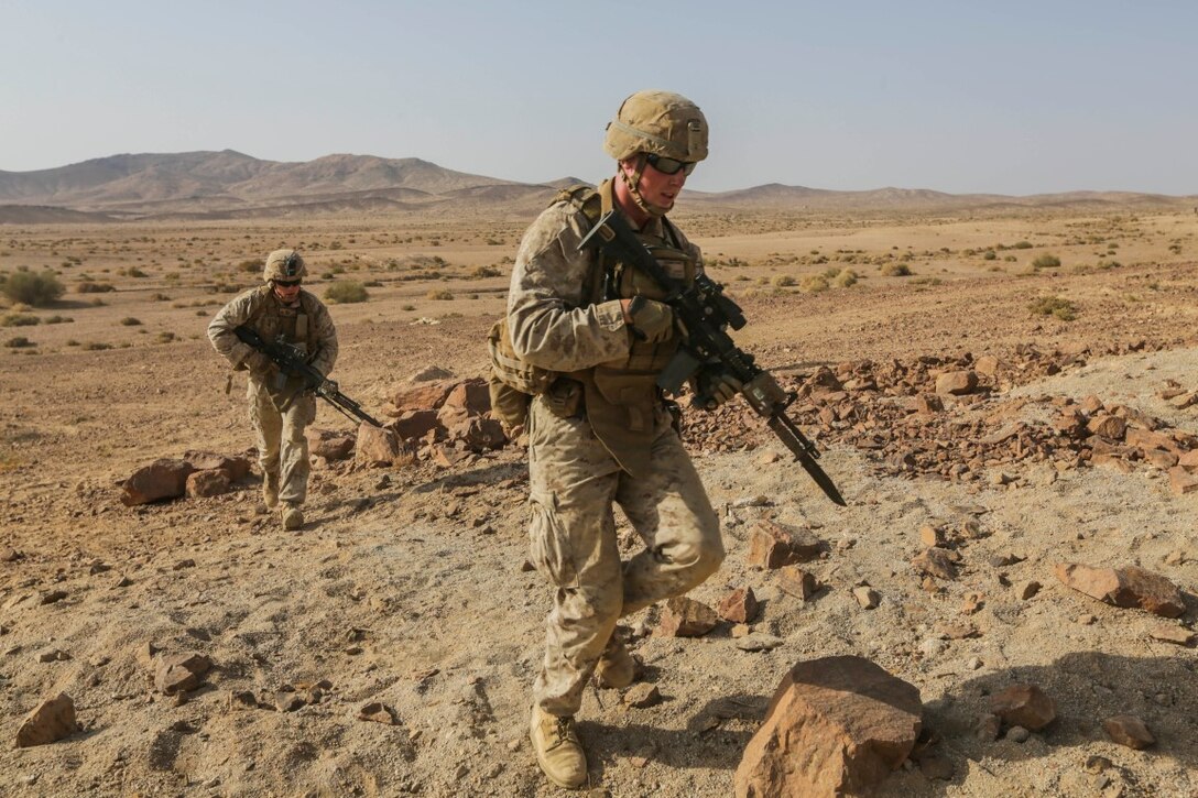 SOUTHWEST ASIA (Sept. 17, 2015) U.S. Marine Lance Cpl. Ethan Covington, right, closes in on his objective during a bi-lateral training exercise. Covington is a rifleman with India Company, Battalion Landing Team 3rd Battalion, 1st Marine Regiment, 15th Marine Expeditionary Unit. The 15th MEU, embarked aboard the ships of the Essex Amphibious Ready Group, is a forward-deployed, flexible sea-based Marine air-ground task force capable of engaging with regional partners and maintaining regional security. (U.S. Marine Corps photo by Sgt. Jamean Berry/Released)