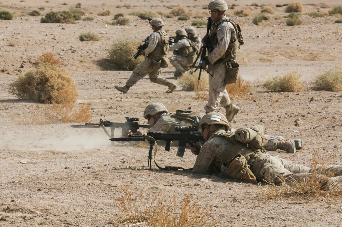 SOUTHWEST ASIA (Sept. 17, 2015) U.S. Marines with India Company, Battalion Landing Team 3rd Battalion, 1st Marine Regiment, 15th Marine Expeditionary Unit, buddy rush toward their objective during a bi-lateral training exercise. The 15th MEU, embarked aboard the ships of the Essex Amphibious Ready Group, is a forward-deployed, flexible sea-based Marine air-ground task force capable of engaging with regional partners and maintaining regional security. (U.S. Marine Corps photo by Sgt. Jamean Berry/Released)