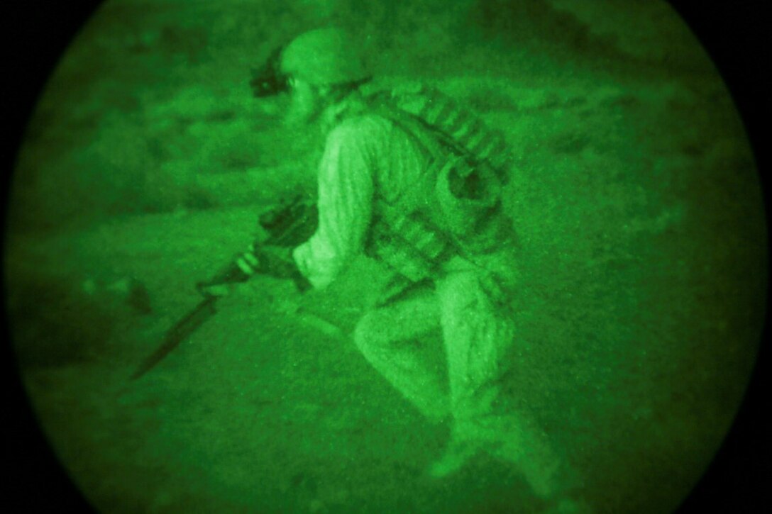 SOUTHWEST ASIA (Sept. 17, 2015)  A U.S. Marine with India Company, Battalion Landing Team 3rd Battalion, 1st Marine Regiment, 15th Marine Expeditionary Unit, rushes to his next firing position during a bi-lateral training exercise. The 15th MEU, embarked aboard the ships of the Essex Amphibious Ready Group, is a forward-deployed, flexible sea-based Marine air-ground task force capable of engaging with regional partners and maintaining regional security. (U.S. Marine Corps photo by Sgt. Jamean Berry/Released)