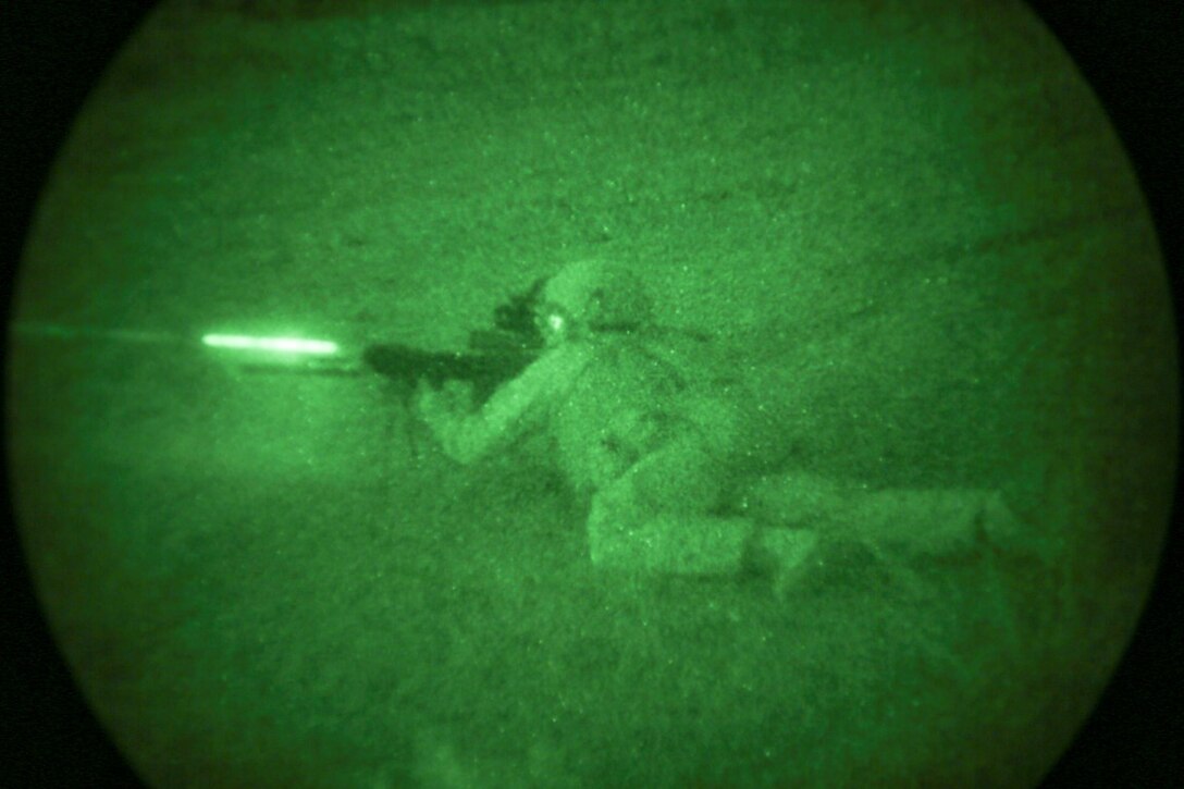 SOUTHWEST ASIA (Sept. 17, 2015)  A U.S. Marine with India Company, Battalion Landing Team 3rd Battalion, 1st Marine Regiment, 15th Marine Expeditionary Unit, fires an infantry automatic rifle during a bi-lateral training exercise. The 15th MEU, embarked aboard the ships of the Essex Amphibious Ready Group, is a forward-deployed, flexible sea-based Marine air-ground task force capable of engaging with regional partners and maintaining regional security. (U.S. Marine Corps photo by Sgt. Jamean Berry/Released)
