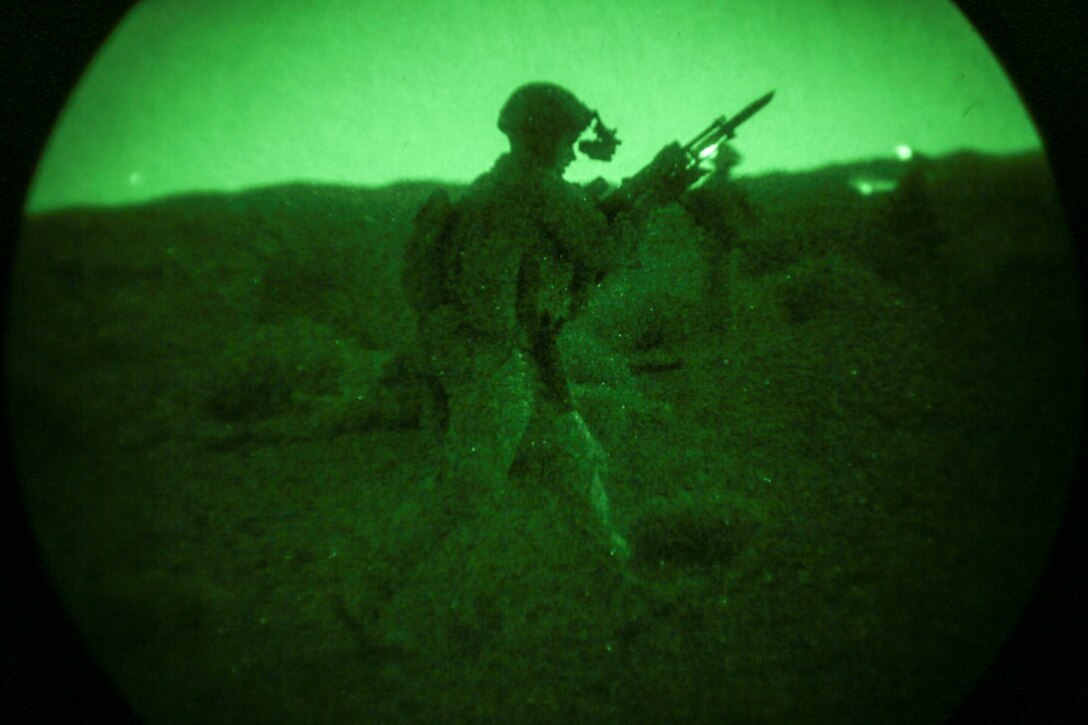 SOUTHWEST ASIA (Sept. 17, 2015)  A. U.S. Marine with India Company, Battalion Landing Team 3rd Battalion, 1st Marine Regiment, 15th Marine Expeditionary Unit, moves to his next firing position during a bi-lateral training exercise. The 15th MEU, embarked aboard the ships of the Essex Amphibious Ready Group, is a forward-deployed, flexible sea-based Marine air-ground task force capable of engaging with regional partners and maintaining regional security. (U.S. Marine Corps photo by Sgt. Jamean Berry/Released)