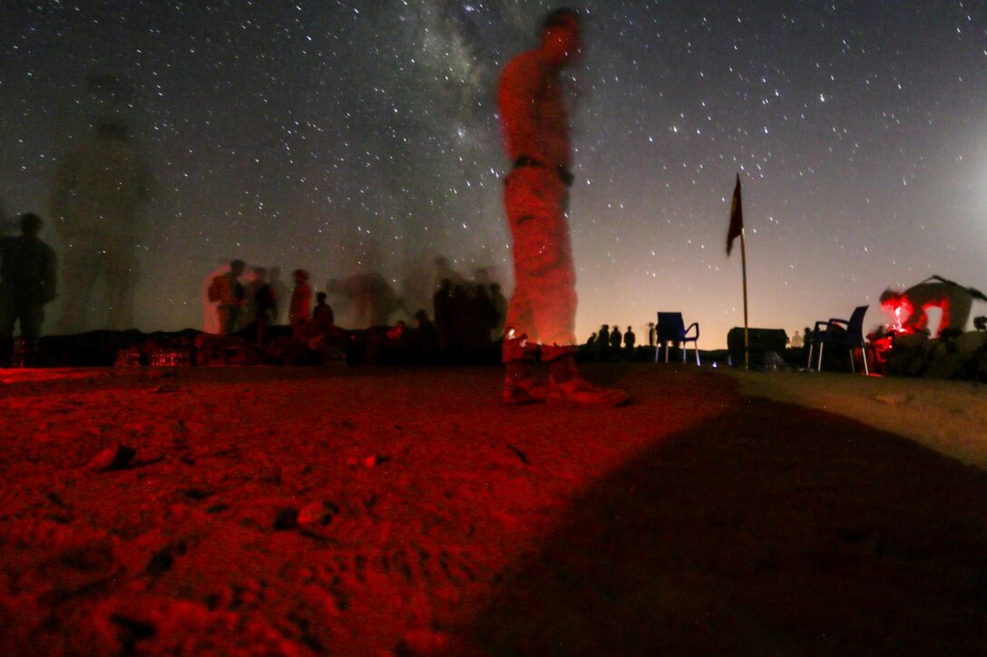 SOUTHWEST ASIA (Sept. 17, 2015) U.S. Marines with India Company, Battalion Landing Team 3rd Battalion, 1st Marine Regiment, 15th Marine Expeditionary Unit, prepare their gear during a bi-lateral training exercise. The 15th MEU, embarked aboard the ships of the Essex Amphibious Ready Group, is a forward-deployed, flexible sea-based Marine air-ground task force capable of engaging with regional partners and maintaining regional security. (U.S. Marine Corps photo by Sgt. Jamean Berry/Released)