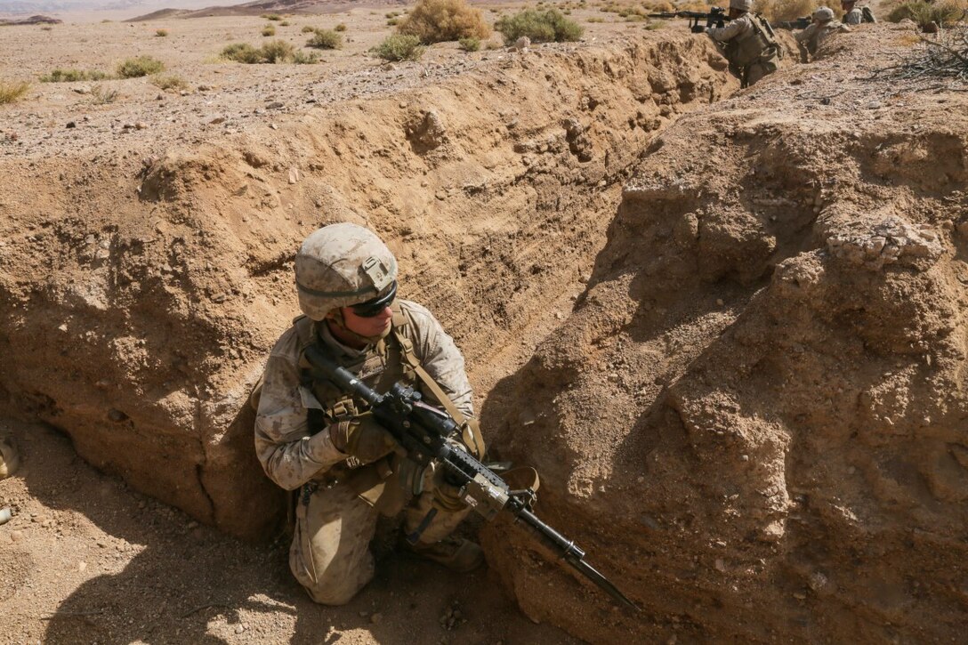 SOUTHWEST ASIA (Sept. 17, 2015) U.S. Marine Lance Cpl. Austin Dollens provides security during a bi-lateral training exercise. Dollens is a rifleman with India Company, Battalion Landing Team 3rd Battalion, 1st Marine Regiment, 15th Marine Expeditionary Unit. The 15th MEU, embarked aboard the ships of the Essex Amphibious Ready Group, is a forward-deployed, flexible sea-based Marine air-ground task force capable of engaging with regional partners and maintaining regional security. (U.S. Marine Corps photo by Sgt. Jamean Berry/Released)