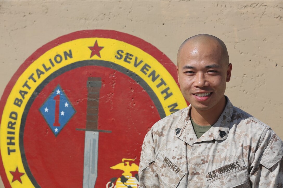 U.S. Marine Sgt. Duc Nguyen, a rifleman, with 3rd Battalion, 7th Marine Division, Ground Combat Element, Special Purpose Marine Corps Air-Ground Task Force – Crisis Response – Central Command, poses for a photo while deployed to Southwest Asia, September 21, 2015. Nguyen joined the Marine Corps at 26, after attending a few years of college and while working a steady career. His unit is the Ground Combat Element of a task force providing the commander of USCENTCOM with a range of nimble solutions to emergent crises across the Middle East. (U.S. Marine Corps photo by Cpl. Jonathan Boynes / released)