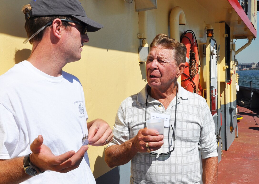 (r-l) Dan Mundy, Sr., of Jamaica Bay Ecowatchers discusses marsh islands restoration in Jamaica Bay with Peter Malinowski, New York Harbor Foundation during Harbor Inspection in September 2015 aboard the DCV Hayward.