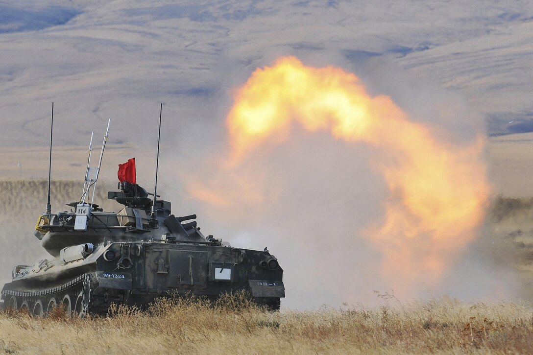 A Japanese tank fires at a target during the culminating live-fire exercise of Rising Thunder at Yakima Training Center, Wash., Sept. 21, 2015. U.S. Army photo by Sgt. Eliverto Larios