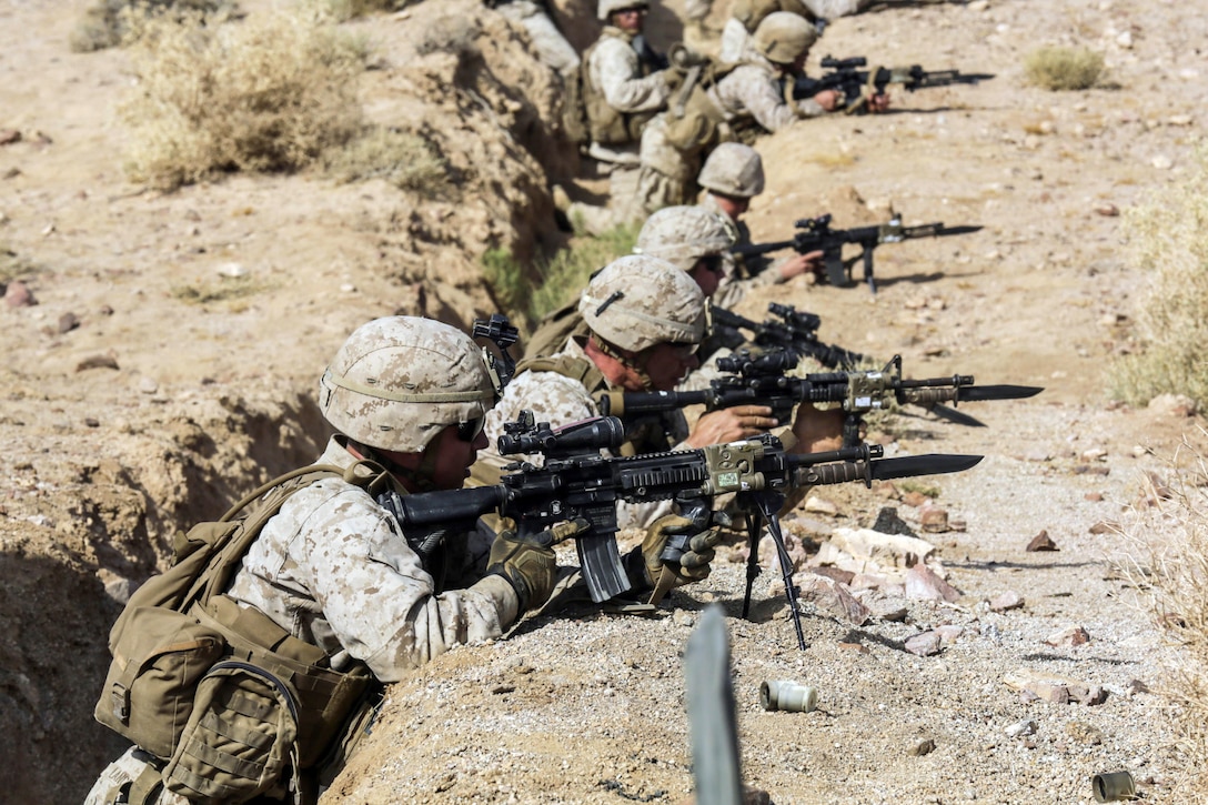 U.S. Marines fire at targets during a bilateral training exercise in Southwest Asia, Sept. 17, 2015. The Marines are assigned to Battalion Landing Team 3rd Battalion, 1st Marine Regiment, 15th Marine Expeditionary Unit. U.S. Marine Corps photo by Sgt. Jamean Berry