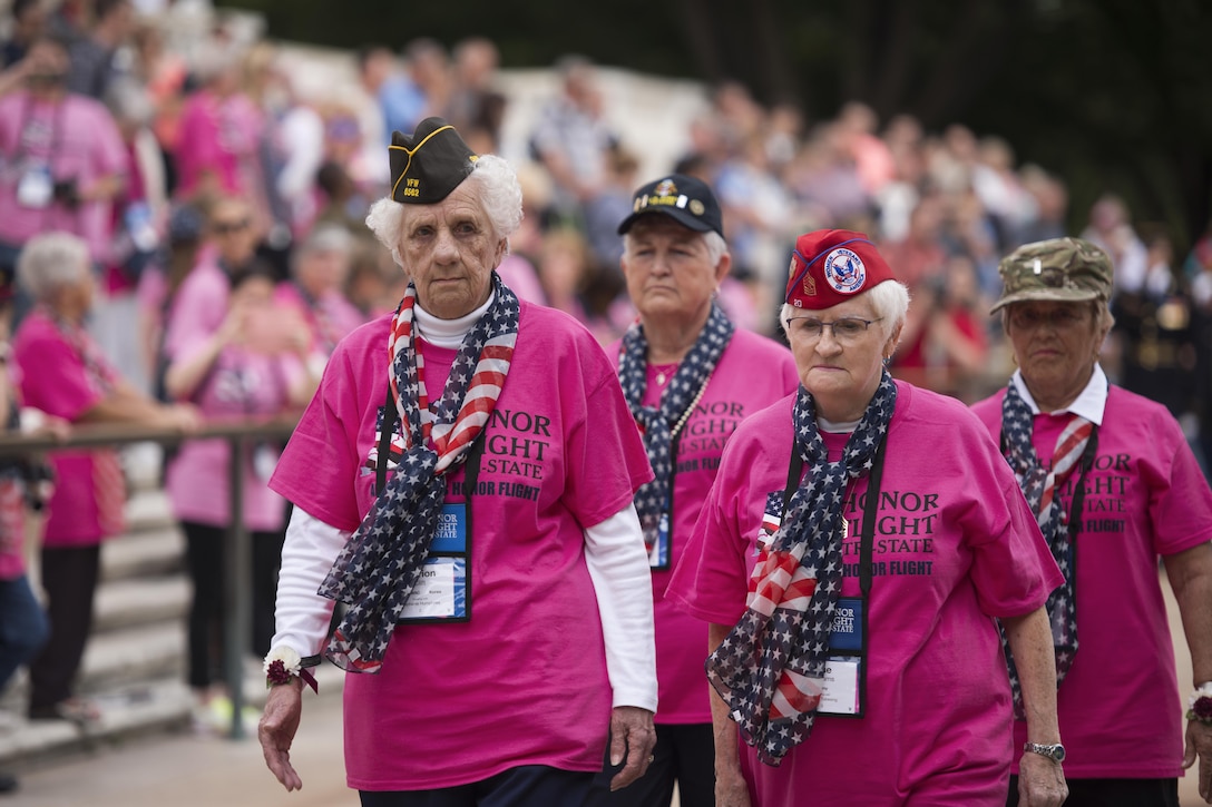 From left, Women’s Army Corps veteran Marion Clift, Army veteran Betty Downs, Army veteran Sue Williams and veteran Army nurse Beverly Reno walk together after laying a wreath at the Tomb of the Unknown Soldier at Arlington National Cemetery in Arlington, Va., Sept. 22, 2015. The women were all members of the first all-female honor flight in the U.S. Seventy-five female veterans from World War II, the Korean War and the Vietnam War attended, as well as 75 escorts who were also female veterans or active-duty military. U.S. Army photo by Rachel Larue