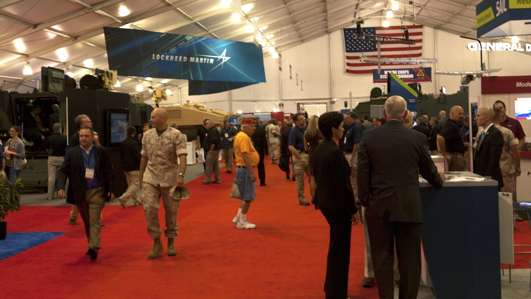 Marines and guests visit vendor booths during the 2015 Modern Day Marine Military Expo at Marine Corps Base Quantico, Va., Sept. 22, 2015. The expo is focusing on enhanced capabilities for expeditionary forces and is happening Sept. 22-24. 