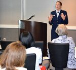 Air Force Capt. Kelly Lonergan, San Antonio Military Medical Center’s inpatient mental health unit nurse at Fort Sam Houston, presents findings from her study on the “Use of Pet Therapy in an Inpatient Behavioral Health Setting” at the TriService Nursing Research Program’s Research and Evidence-based Practice Dissemination Course in San Antonio Aug. 31-Sept. 3.