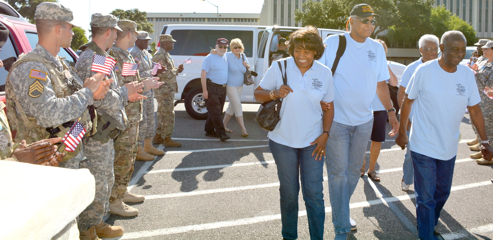 Vietnam War veteran medics, who served with Company C, 23rd Medical Battalion, Americal Division, and their spouses visiting Fort Sam Houston Sept. 12, received a hero’s welcome from Soldier medics who lined each side of the entrance to MacArthur Parade Pavilion waving U.S. flags and applauding as the veterans entered the pavilion.