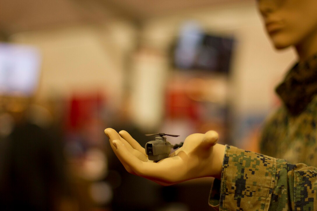 Prox Dynamics Team, from Alexandria, Va., hosts a booth of advanced personal reconnaissance systems at the Modern Day Marine Military Exposition aboard MCBQ, Sept. 22. The company creates solutions to modern warfighting issues using microelectronics.