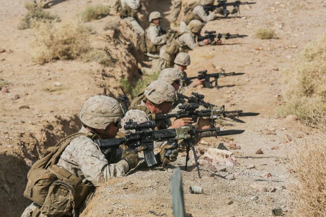 U.S. Marines with India Company, Battalion Landing Team 3rd Battalion, 1st Marine Regiment, 15th Marine Expeditionary Unit, fire at targets during a bi-lateral training exercise in Southwest Asia on Sept. 17, 2015. The 15th MEU, embarked aboard the ships of the Essex Amphibious Ready Group, is a forward-deployed, flexible sea-based Marine air-ground task force capable of engaging with regional partners and maintaining regional security. 