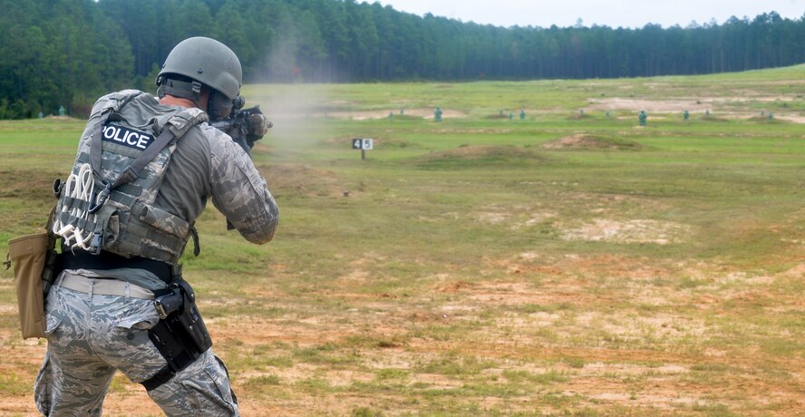 Senior Airman Mark Witt, 2nd Security Forces Squadron Base Defense Operations Center controller, fires an M4 carbine while training for the 2015 Global Strike Challenge at Fort Polk, La., Sept. 11, 2015. Witt and his teammates will compete in a variety of tasks including tactical movement, security knowledge and firing skills. The challenge places missile and bomb crews, security forces and aircraft maintainers from Air Force Global Strike Command in a head-to-head competition. (U.S. Air Force photo/Airman 1st Class Mozer Da Cunha)