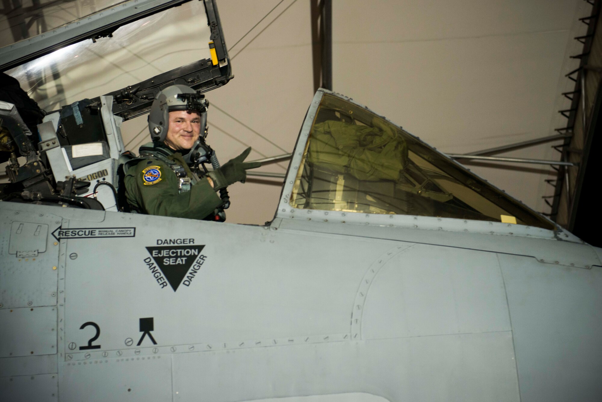 U.S. Air Force Lt. Col. Bryan France, 74th Fighter Squadron commander, poses for a photo inside an A-10C Thunderbolt II before departure Sept. 19, 2015, at Moody Air Force Base, Ga. France took flight to Amari Air Base, Estonia, to command the 74th Expeditionary Fighter Squadron in support of Operation Atlantic Resolve. (U.S. Air Force photo by Airman 1st Class Dillian Bamman/Released)