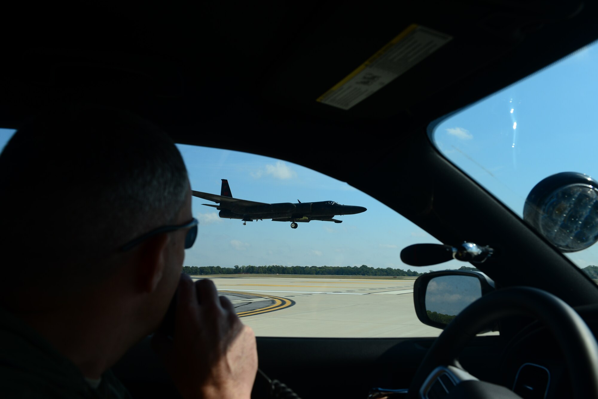 Lt. Col. Christopher, U-2 pilot with the 1st Reconnaissance Squadron, Beale Air Force Base, California, drives a mobile chase car to aid a U-2 Dragon Lady land during an air show at Joint Base Andrews, Maryland, Sep. 19, 2015. The U-2 Dragon Lady will be on display during the California Capital Air Show at Mather Airport in Sacramento county Oct. 3-4, 2015. (U.S. Air Force photo by Senior Airman Bobby Cummings)